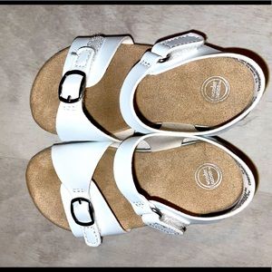 White sandals worn once